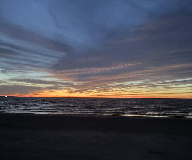 A sunset over the water